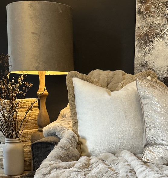 Hugo Cushion with feather insert.